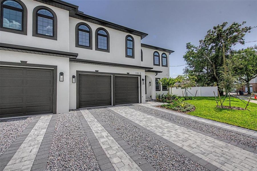 Front exterior of a new home in , Tampa, FL, highlighting curb appeal (Image 2). Front exterior of a new home in , Tampa, FL, highlighting curb appeal (Image 2).