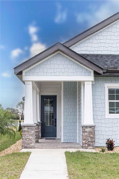 Front exterior of a new home in , Oxford, FL, highlighting curb appeal (Image 21).