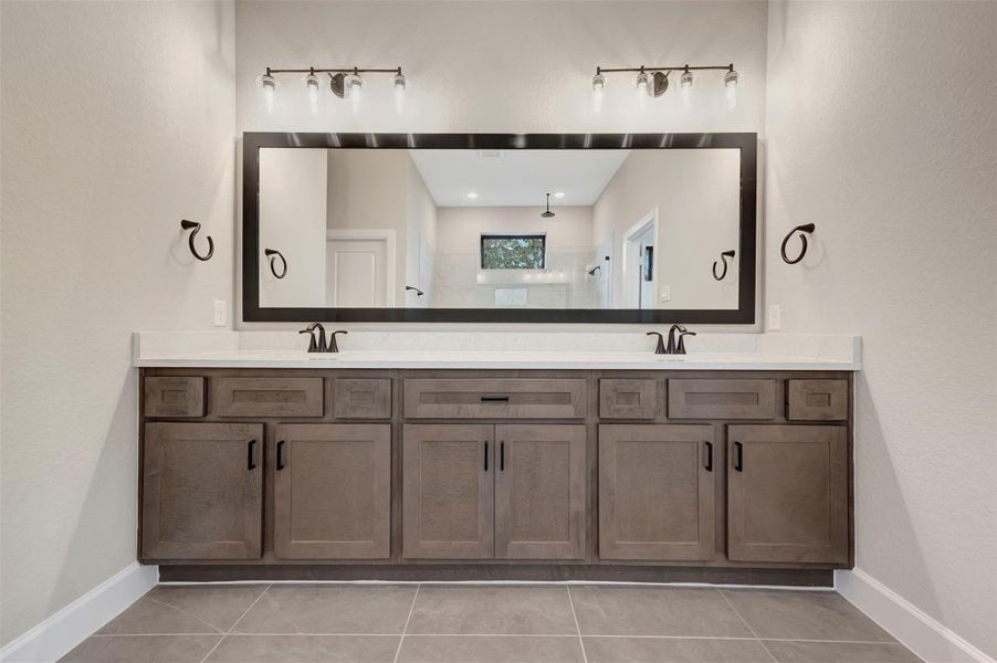Furnished interior view inside a new home in COLTON - Reserve Collection, Todd Mission (Image 32).