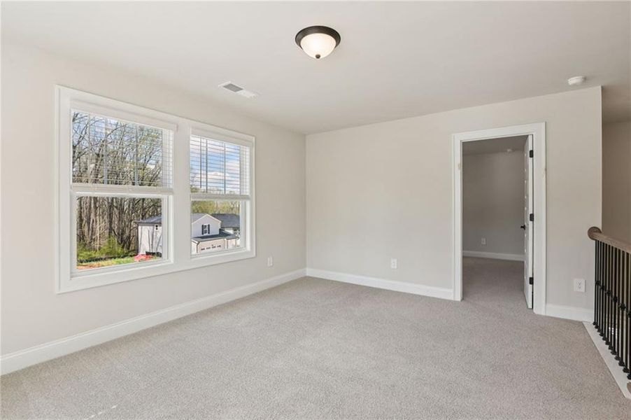 Spacious, unfurnished interior of a new home in Hemingway - Reserve Series, Cumming (Image 40).