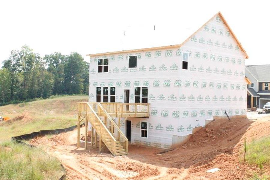 Front exterior of a new home in , Commerce, GA, highlighting curb appeal (Image 2).