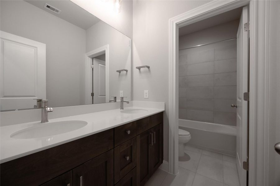 Furnished interior view inside a new home in Sunterra, Katy (Image 5). Furnished interior view inside a new home in Sunterra, Katy (Image 5).