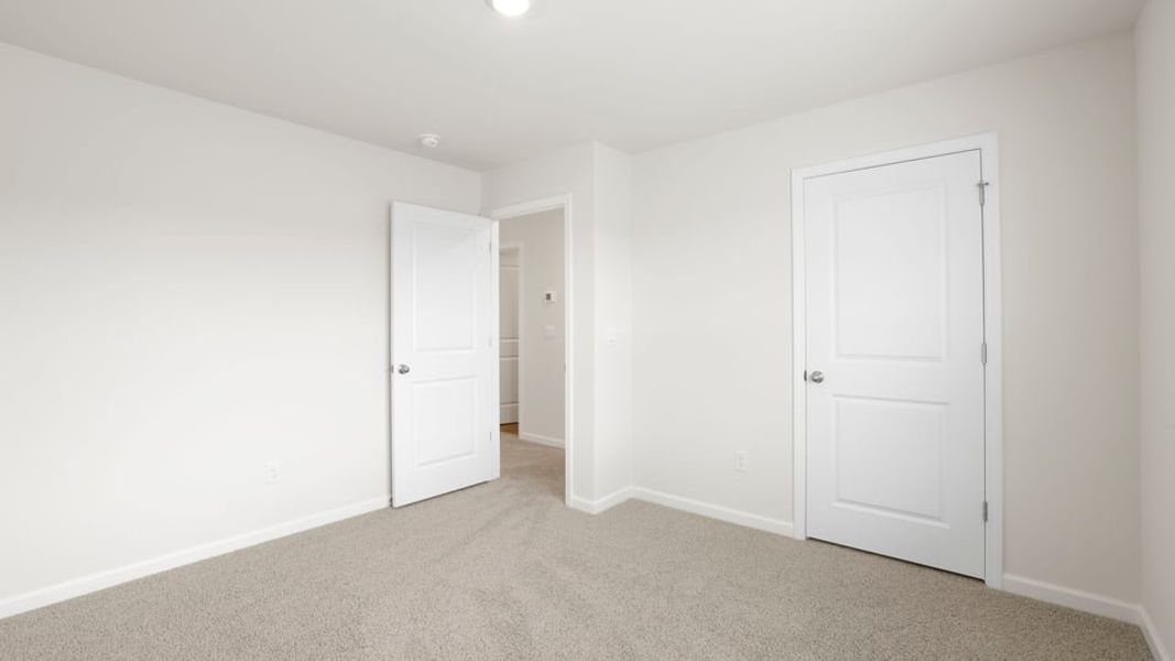 Spacious, unfurnished interior of a new home in Bentley Park, Greenwood (Image 32). Spacious, unfurnished interior of a new home in Bentley Park, Greenwood (Image 32).