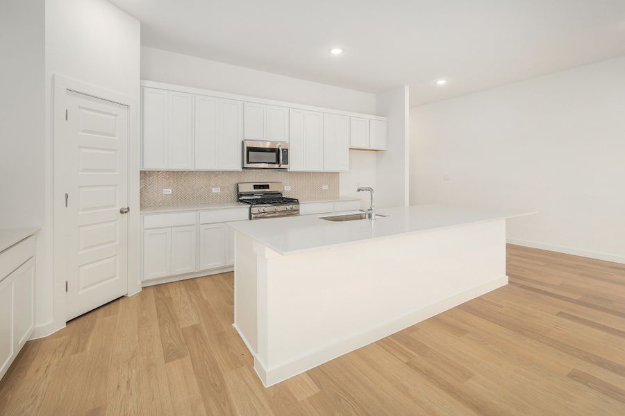 Furnished interior view inside a new home in Prairie Winds, Hutto (Image 7).