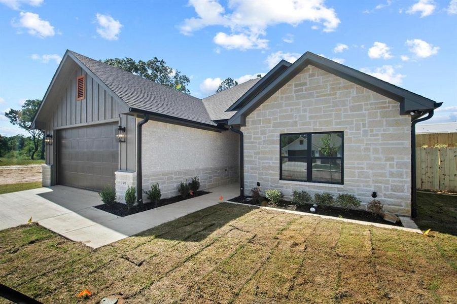 Front exterior of a new home in , Athens, TX, highlighting curb appeal (Image 22).