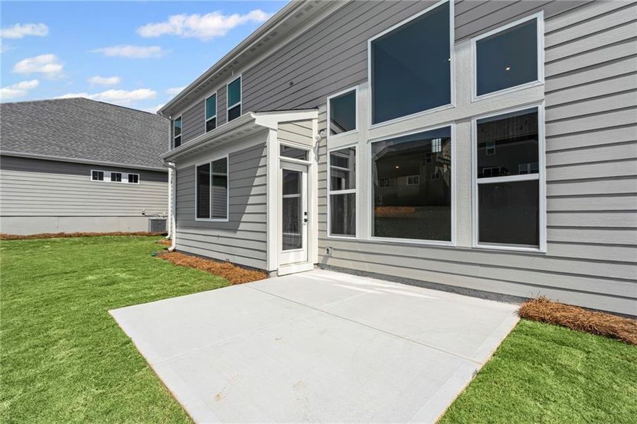 Front exterior of a new home in Twin Lakes, Hoschton, GA, highlighting curb appeal (Image 23). Front exterior of a new home in Twin Lakes, Hoschton, GA, highlighting curb appeal (Image 23).