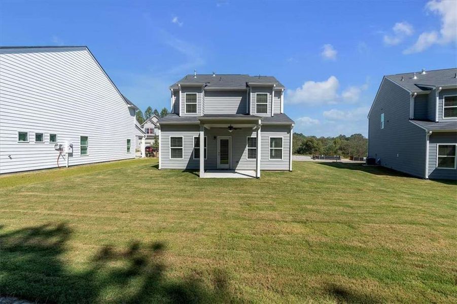 Exterior details and patio area of a home in The View at Groover's Lake, Lithia Springs (Image 21).