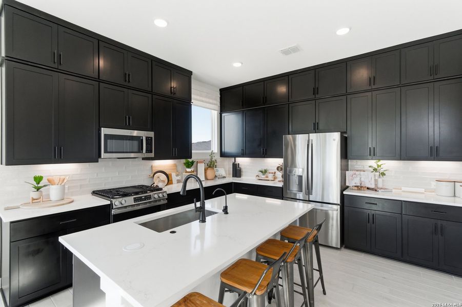 Furnished interior view inside a new home in Centero at Stone Oak, San Antonio (Image 24).