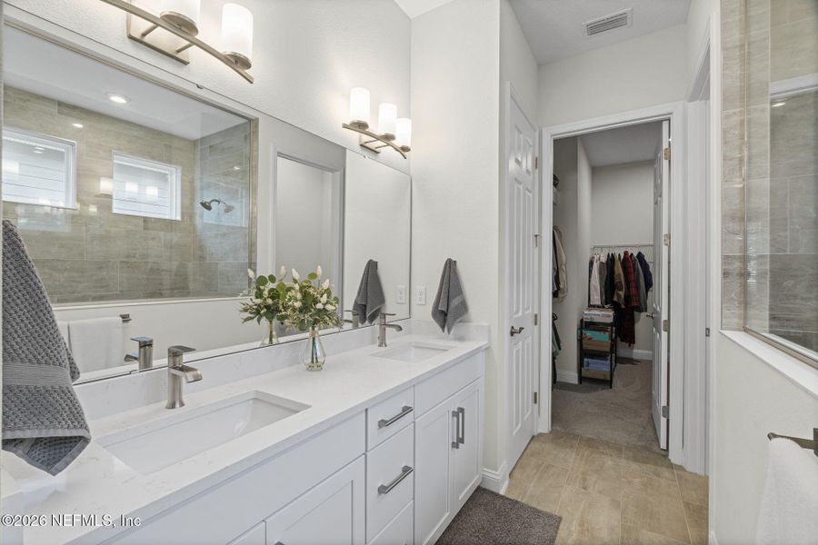 Furnished interior view inside a new home in RiverTown - WaterSong, St. Johns (Image 13).