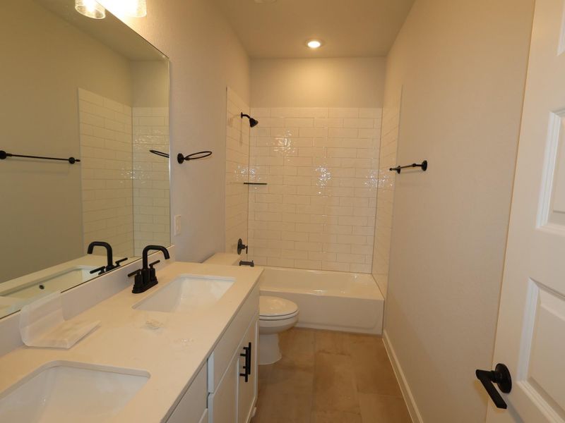Furnished interior view inside a new home in Cedar Brook, Leander (Image 12).