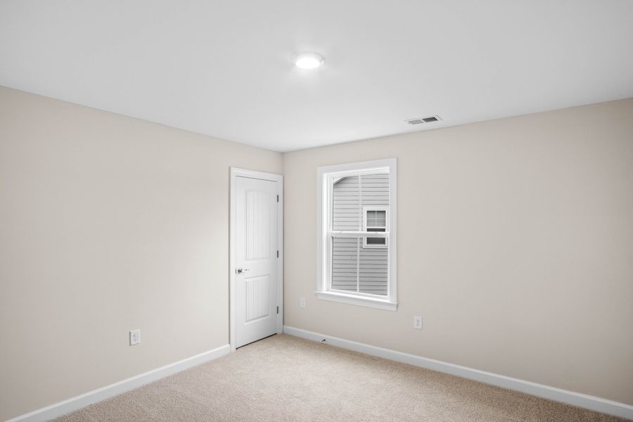 Spacious, unfurnished interior of a new home in Waterbridge, Myrtle Beach (Image 28).