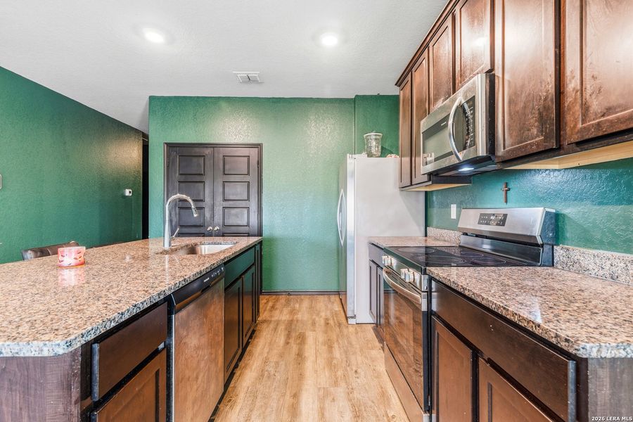Furnished interior view inside a new home in Lonesome Dove, San Antonio (Image 18).