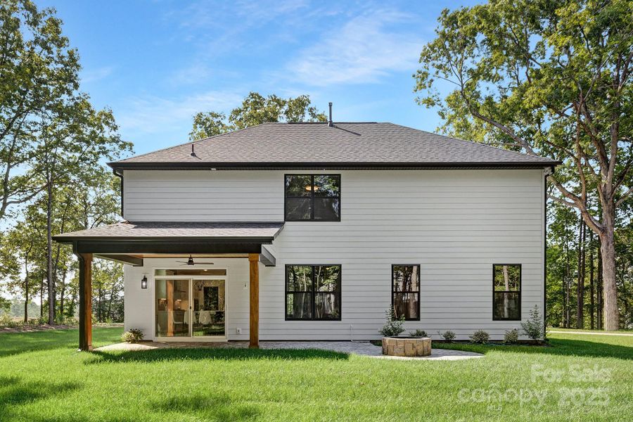 Front exterior of a new home in , Waxhaw, NC, highlighting curb appeal (Image 21). Front exterior of a new home in , Waxhaw, NC, highlighting curb appeal (Image 21).