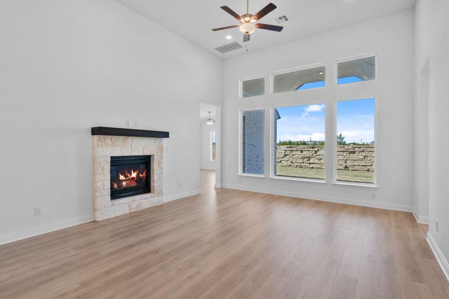 Family Room with high ceiling & fireplace