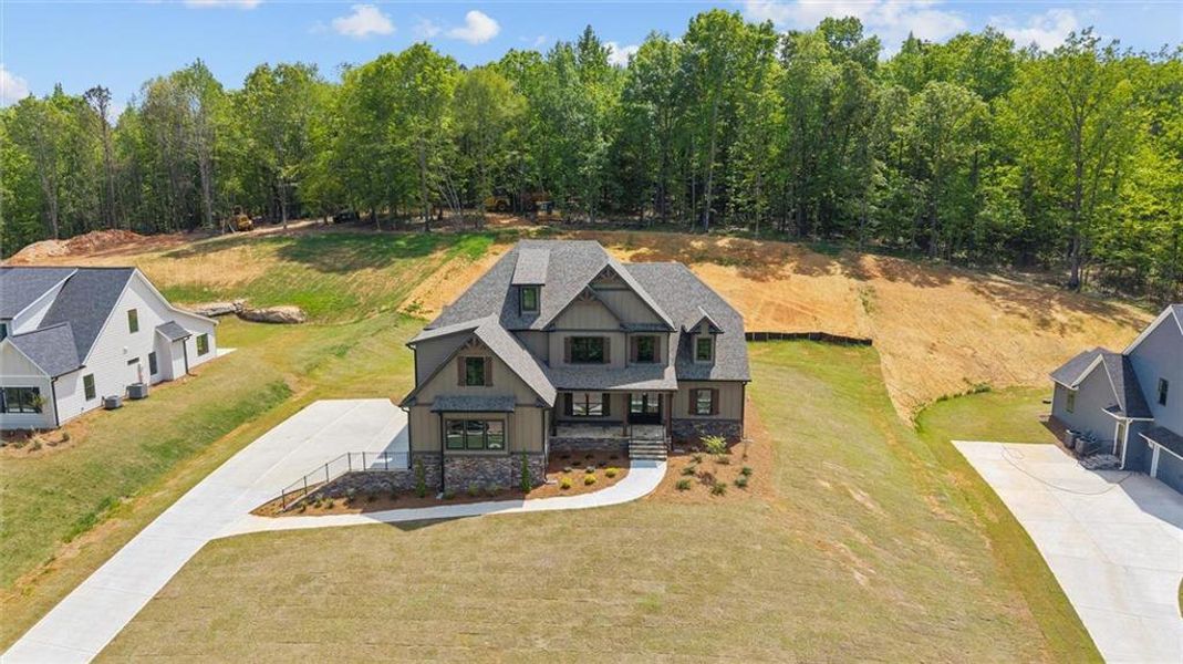 Front exterior of a new home in , Carrollton, GA, highlighting curb appeal (Image 25).