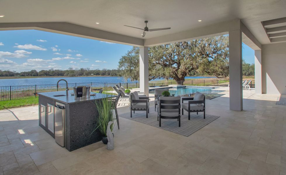 Exterior details and patio area of a home in West Hill Estates, Dade City (Image 22).