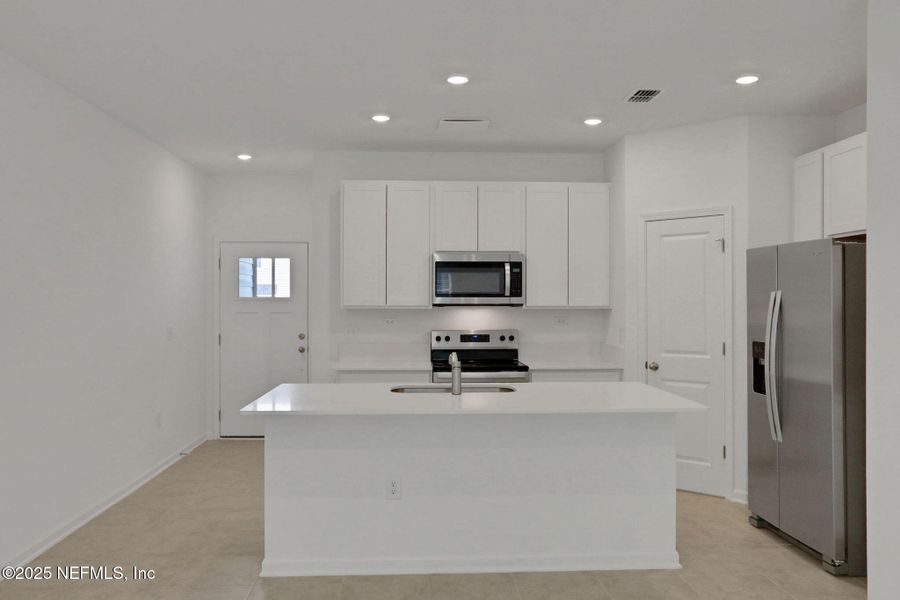 Furnished interior view inside a new home in Atlantis Pointe, Middleburg (Image 15).