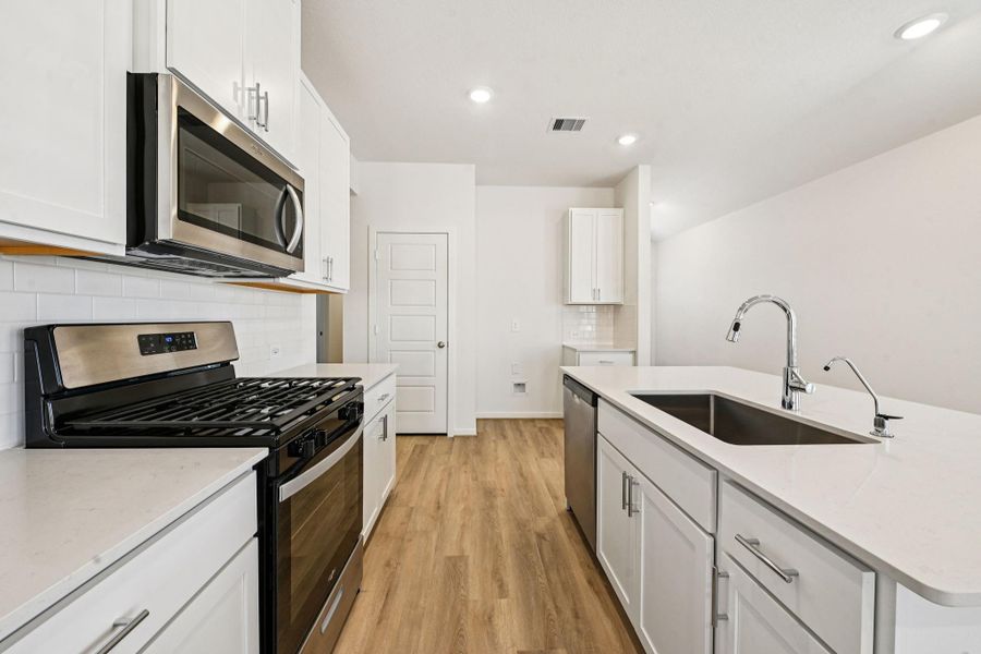 Furnished interior view inside a new home in Granger Pointe - Traditional Series, Conroe (Image 13).