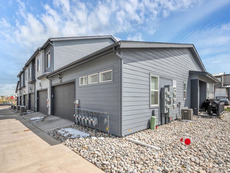 Exterior details and patio area of a home in Green Gables, Denver (Image 4).