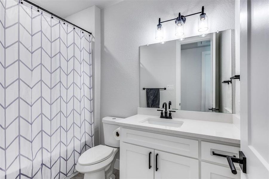 Full bathroom in hallway on second floor