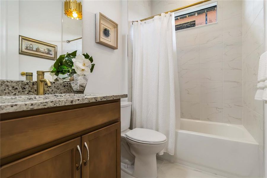 Bathroom Three with Shower in Tub