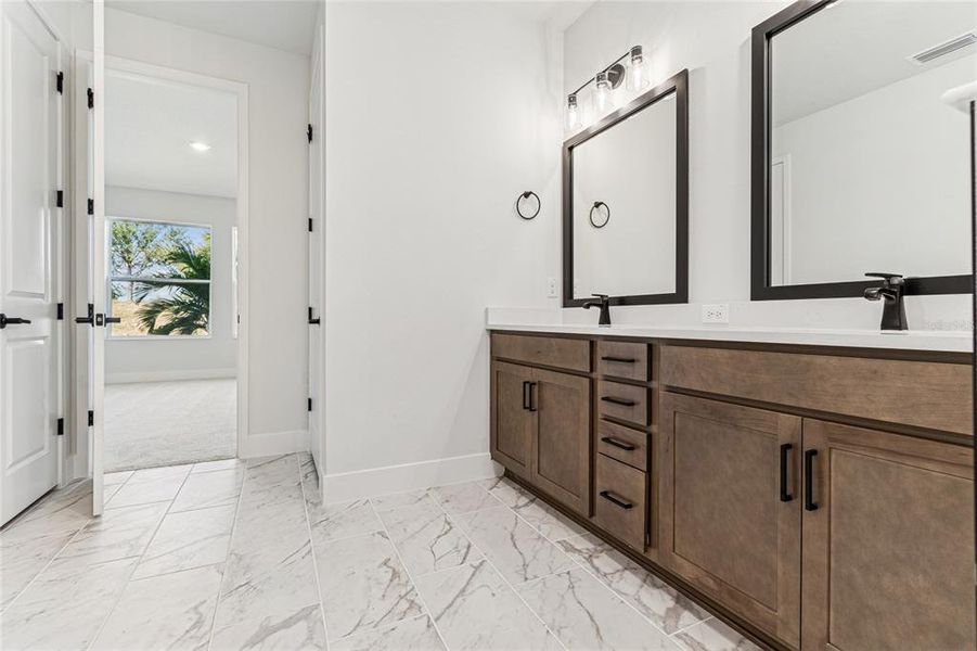 Furnished interior view inside a new home in North River Ranch - Cottage Series, Parrish (Image 16).