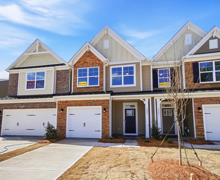 Front exterior of a new home in Harrisburg Village Townhomes, Harrisburg, NC, highlighting curb appeal (Image 27).