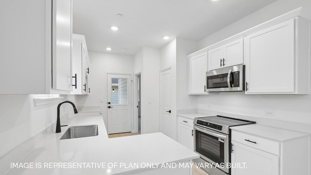 Furnished interior view inside a new home in Avery Centre, Round Rock (Image 11).