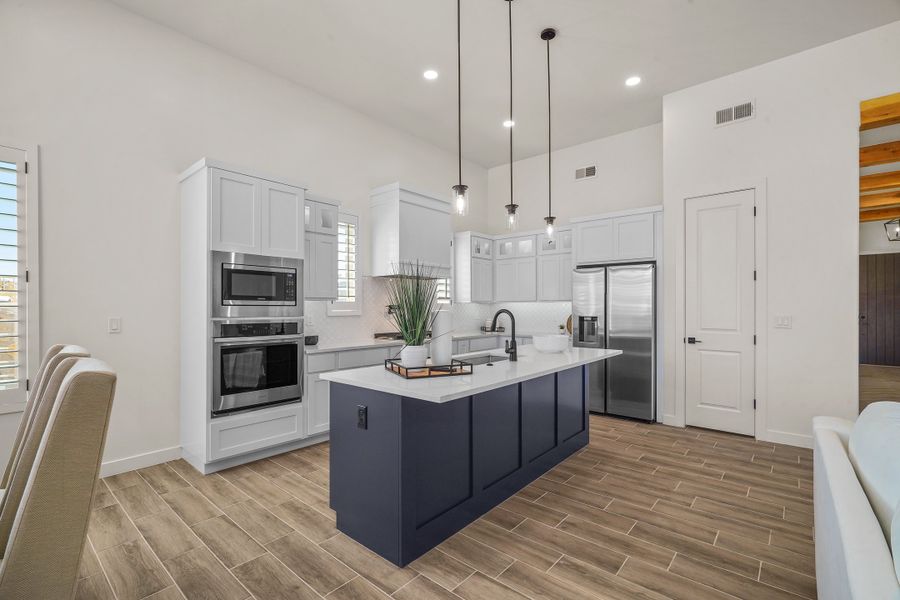 Representative furnished interior of a home built from the Escondido by LEH. Homes in Verdancia, El Paso (Image 40).