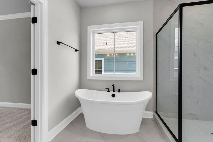 Furnished interior view inside a new home in Tidewater at Lakes of Cane Bay, Summerville (Image 3).