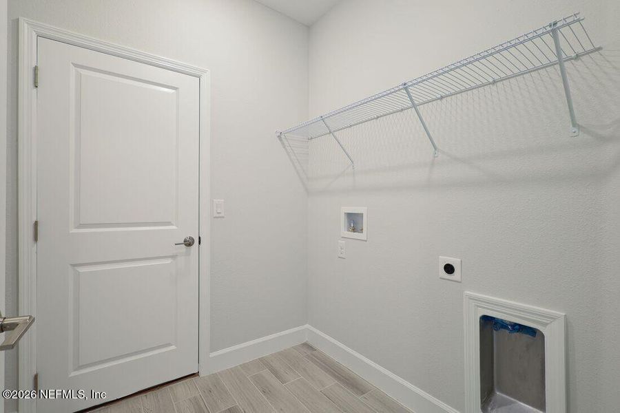 Spacious, unfurnished interior of a new home in Colbert Landings, Palm Coast (Image 11).