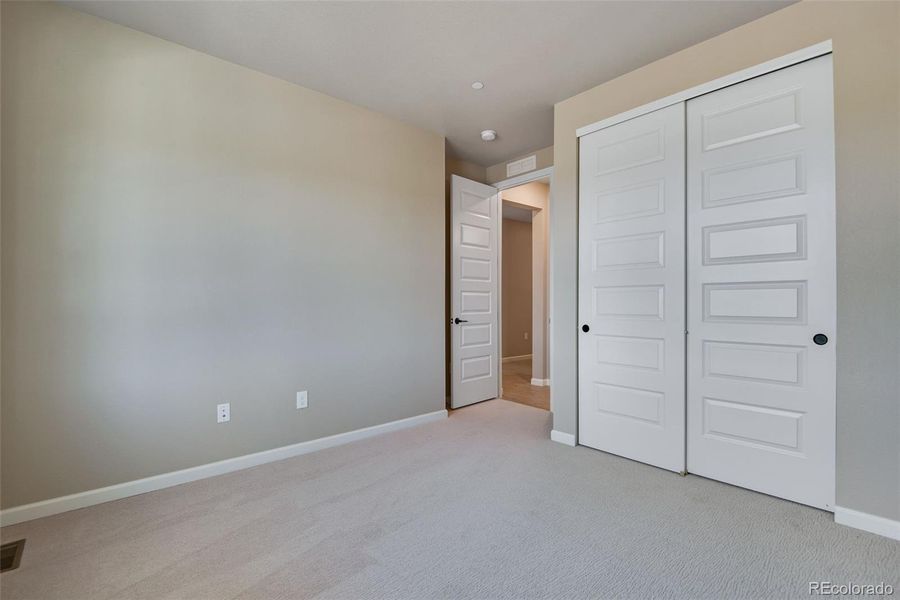 Spacious, unfurnished interior of a new home in Reunion Ridge, Commerce City (Image 35).