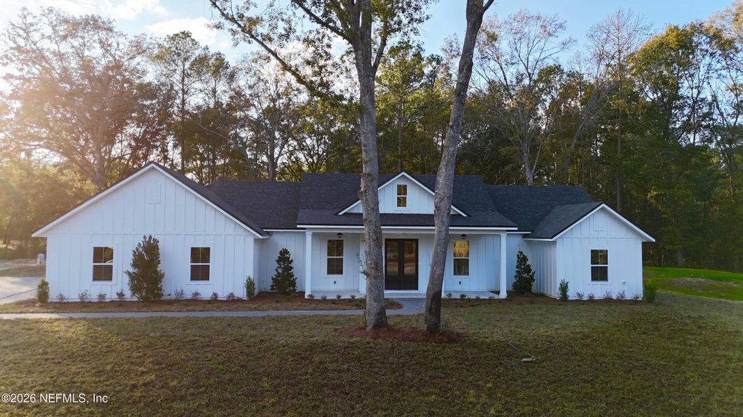 Front exterior of a new home in , Macclenny, FL, highlighting curb appeal (Image 2). Front exterior of a new home in , Macclenny, FL, highlighting curb appeal (Image 2).
