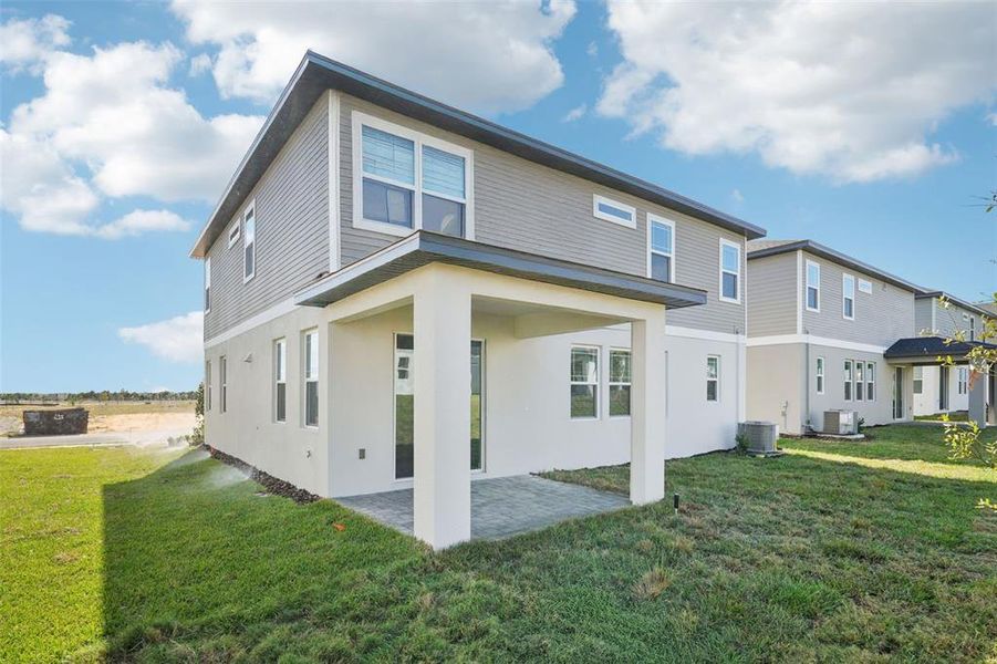 Exterior details and patio area of a home in Cyrene at Minneola, Minneola (Image 20). Exterior details and patio area of a home in Cyrene at Minneola, Minneola (Image 20).