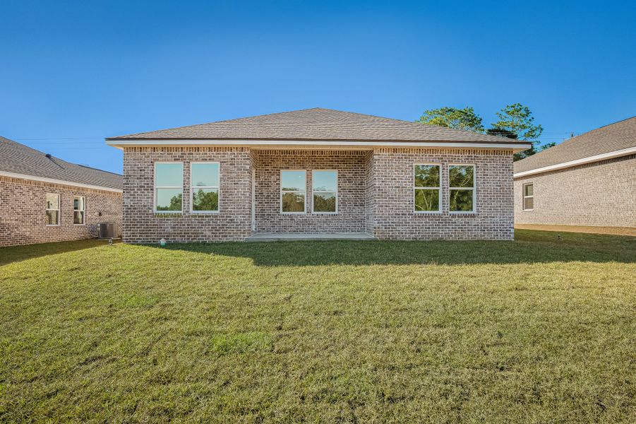 Exterior details and patio area of a home in Blossom Grove, Crestview (Image 22).