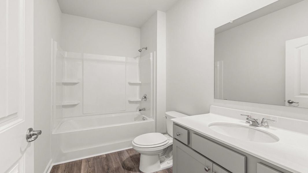 Representative furnished interior of a home built from the Cali by D.R. Horton in Hamptons at Riverwood North, Dallas (Image 11).