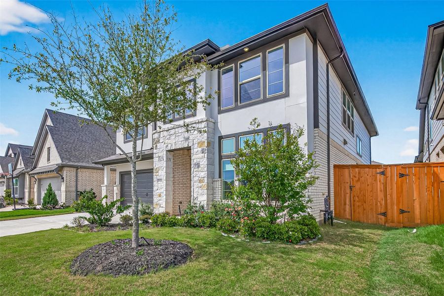 Front exterior of a new home in , Cypress, TX, highlighting curb appeal (Image 27). Front exterior of a new home in , Cypress, TX, highlighting curb appeal (Image 27).