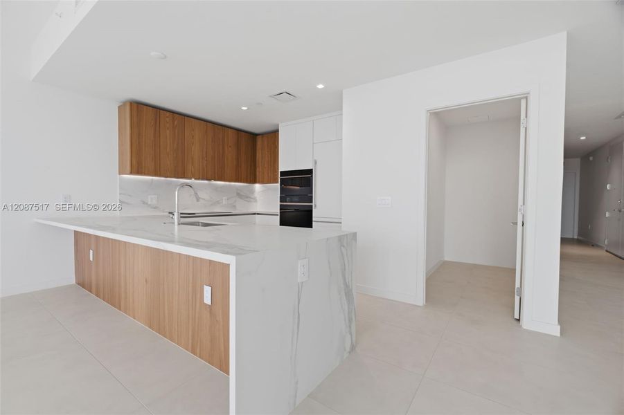 Furnished interior view inside a new home in , Miami (Image 9).