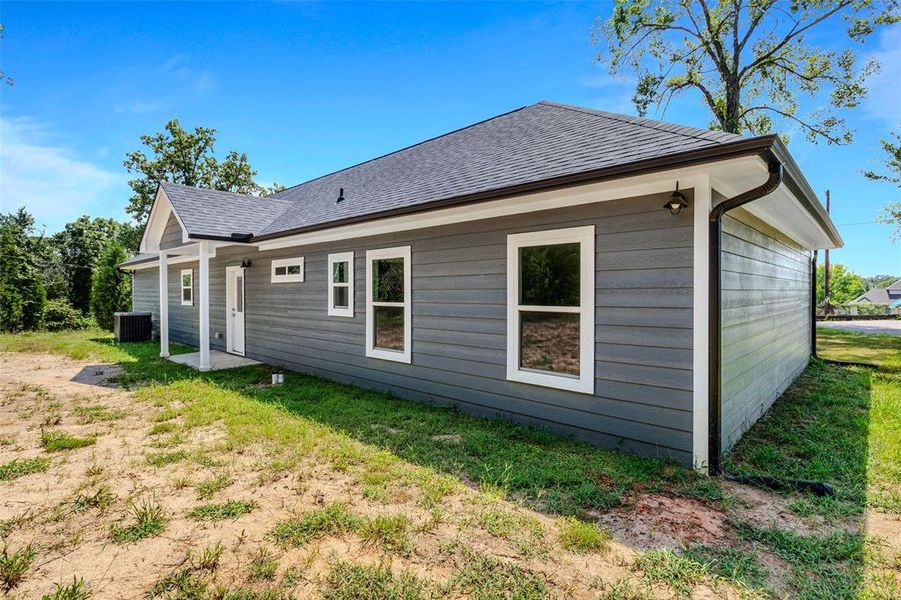 Exterior details and patio area of a home in , Log Cabin (Image 20).