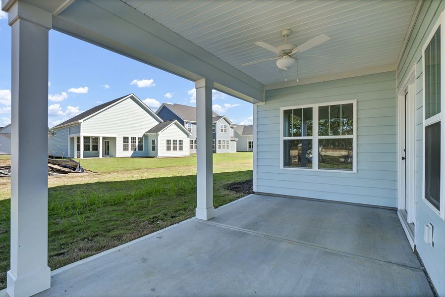 Exterior details and patio area of a home in Grand Park, Leland (Image 2).