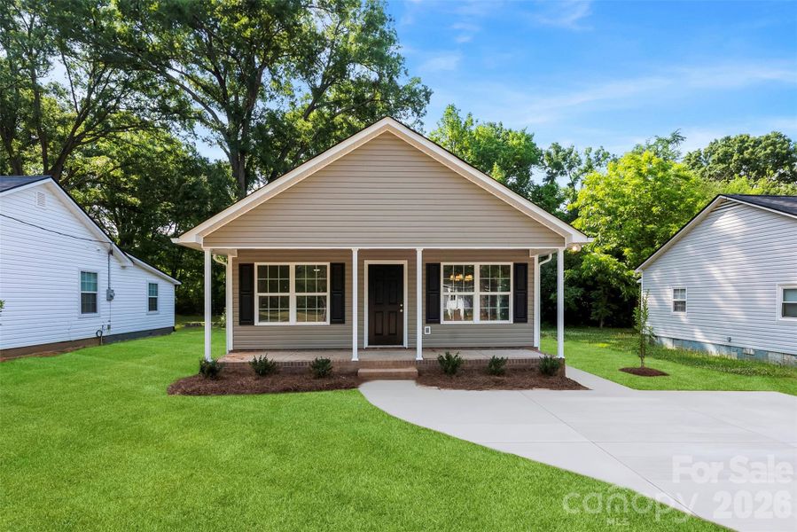 Front exterior of a new home in , Rock Hill, SC, highlighting curb appeal (Image 1). Front exterior of a new home in , Rock Hill, SC, highlighting curb appeal (Image 1).