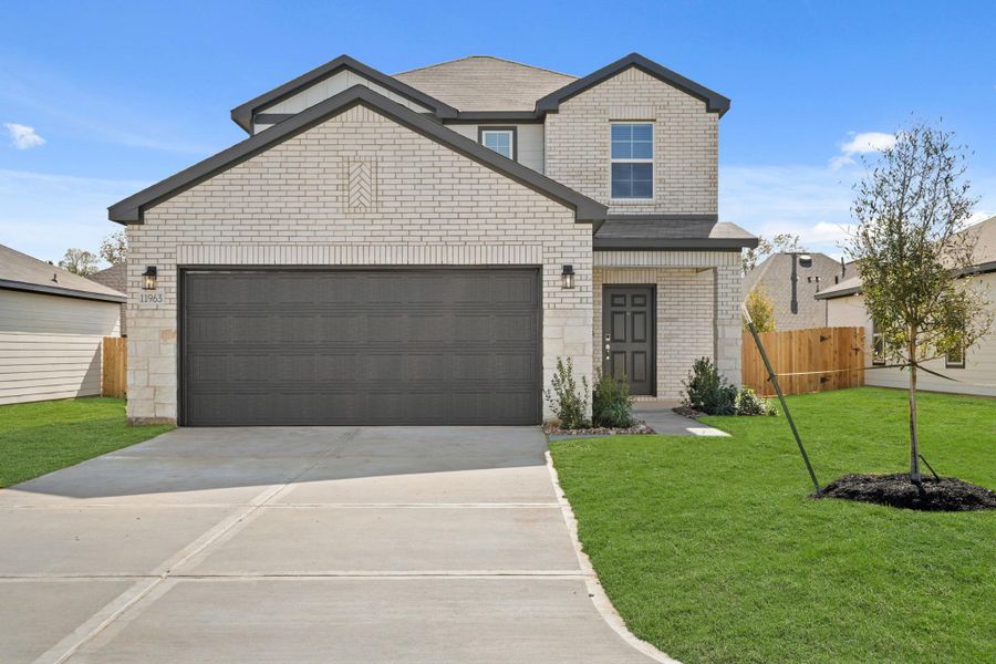 Front exterior of a new home in Lexington Heights, Willis, TX, highlighting curb appeal (Image 1). Front exterior of a new home in Lexington Heights, Willis, TX, highlighting curb appeal (Image 1).