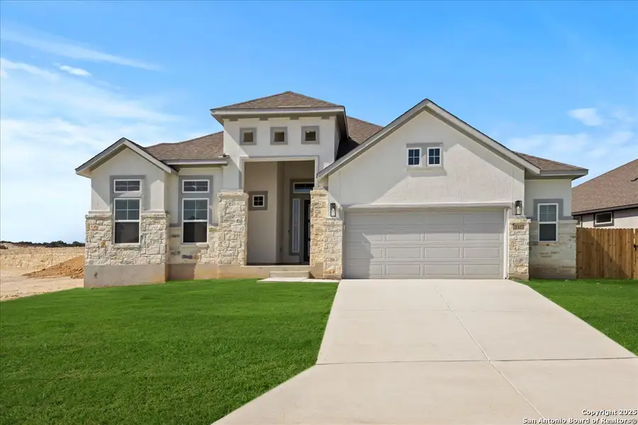 Front exterior of a new home in Meyer Ranch, New Braunfels, TX, highlighting curb appeal (Image 1). Front exterior of a new home in Meyer Ranch, New Braunfels, TX, highlighting curb appeal (Image 1).
