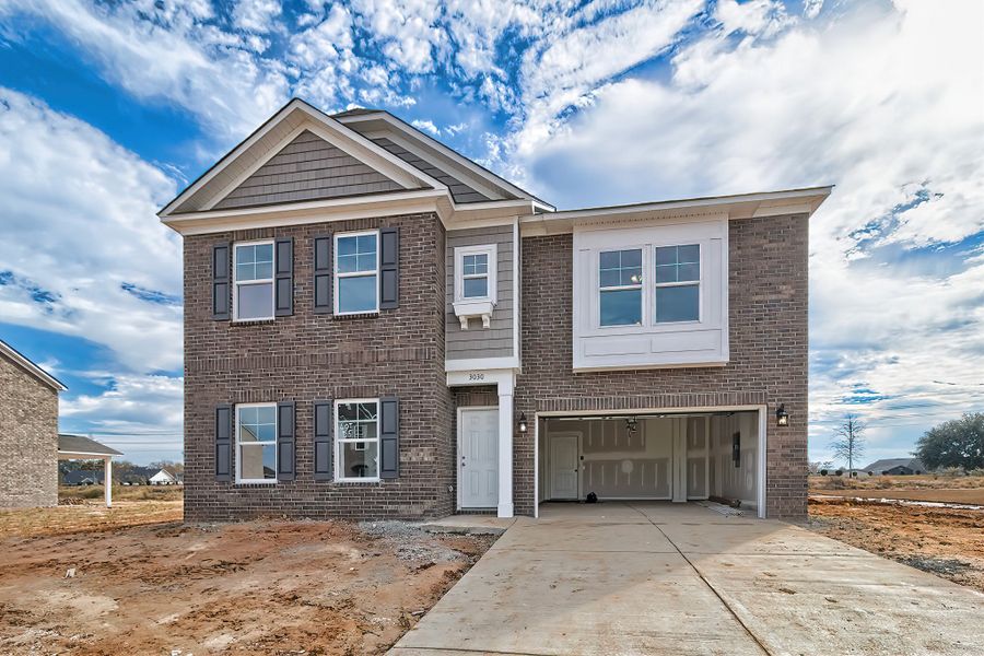 Representative exterior photo of a completed home built from the Devereaux II by Great Southern Homes in Beach Forest, Sumter, SC (Image 5). Representative exterior photo of a completed home built from the Devereaux II by Great Southern Homes in Beach Forest, Sumter, SC (Image 5).