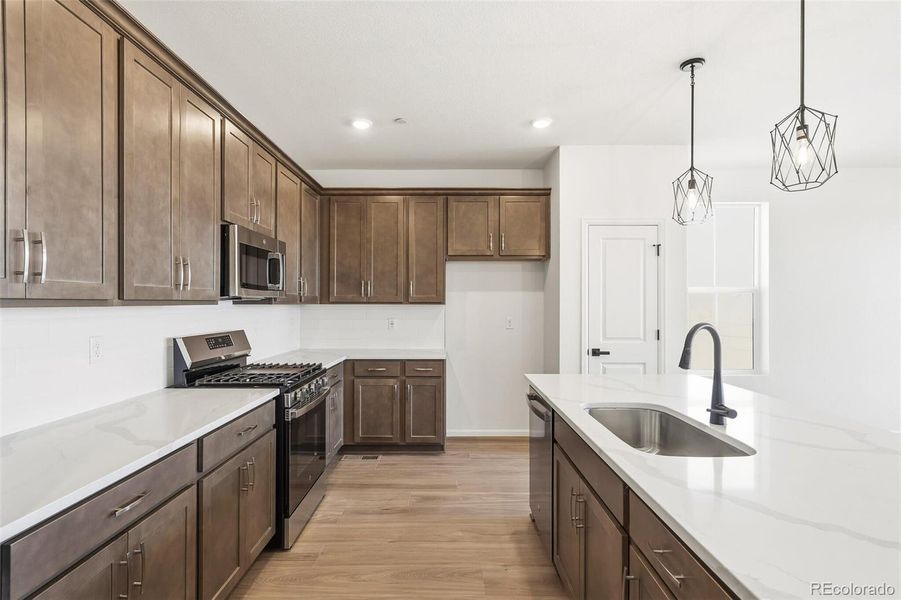Furnished interior view inside a new home in The Nest Classic at Canyon Creek, Erie (Image 8).
