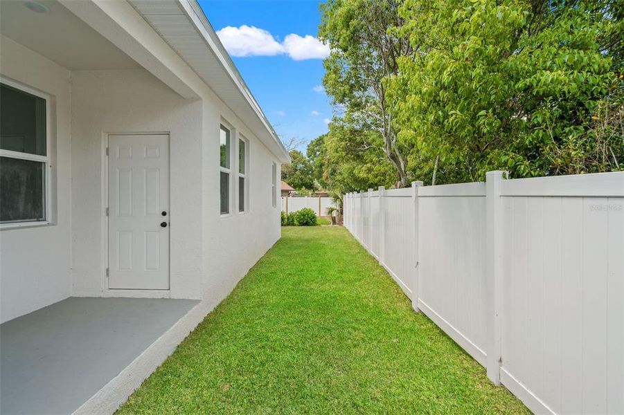 Exterior details and patio area of a home in , Holiday (Image 3).