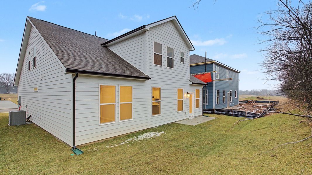 Exterior details and patio area of a home in Cottages of Bearwood, Mount Pleasant (Image 22).