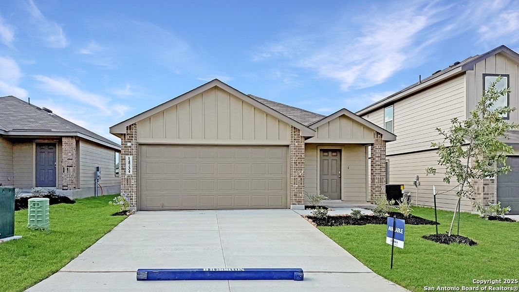 Front exterior of a new home in Stonehill, San Antonio, TX, highlighting curb appeal (Image 1). Front exterior of a new home in Stonehill, San Antonio, TX, highlighting curb appeal (Image 1).