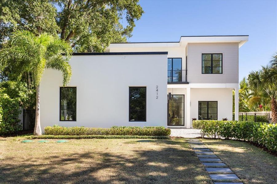 Front exterior of a new home in , Winter Park, FL, highlighting curb appeal (Image 28). Front exterior of a new home in , Winter Park, FL, highlighting curb appeal (Image 28).