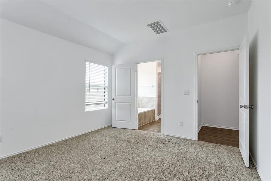 Primary Bedroom at back of home off living room